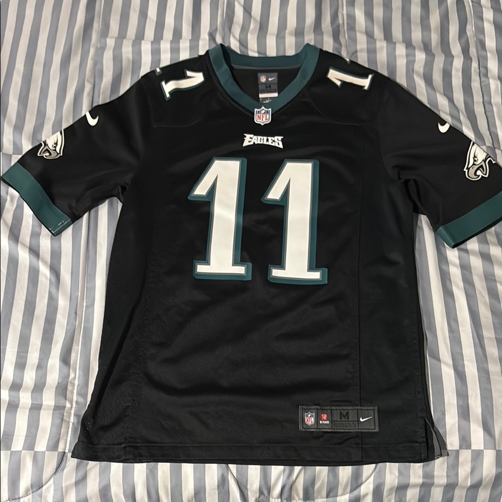 Black and green Eagles Carson Wentz jersey.